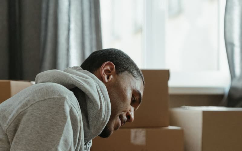 Carpenter assembling furniture after a move